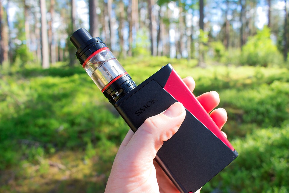 man holding vape pen